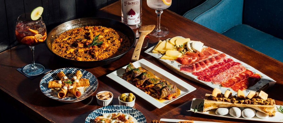 A selection of Spanish tapas dishes set out on a table