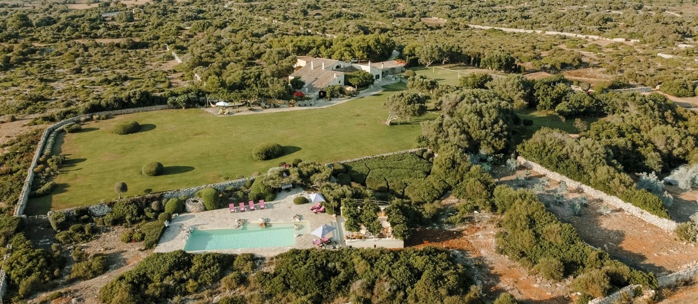 Aerial view of house and pool of Binicalaf, luxury villa in Menorca