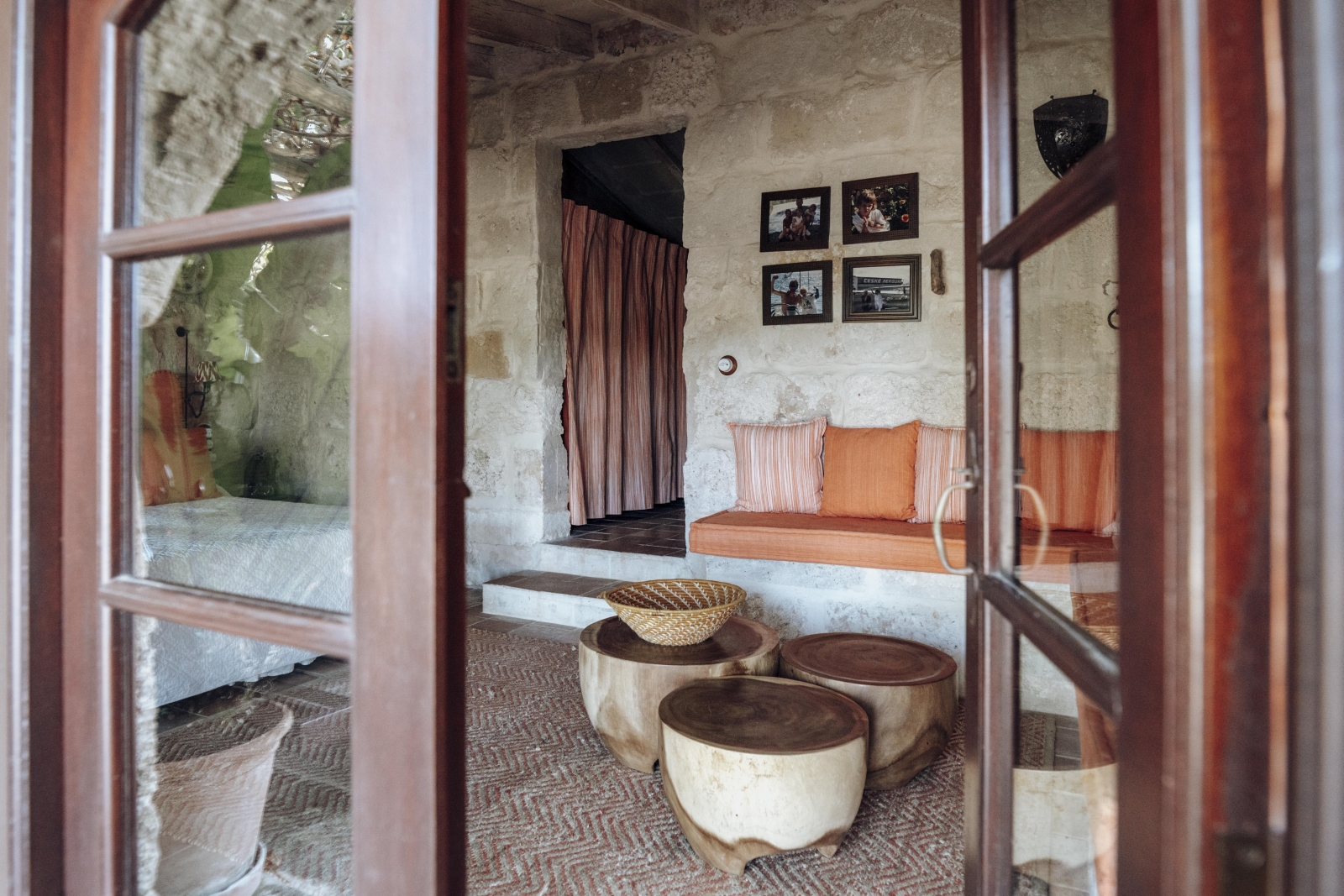 View into bedroom and private sitting area at Binicalaf