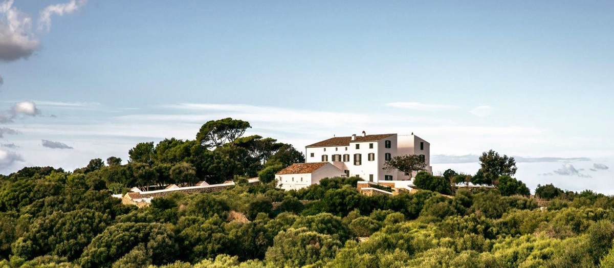 panoramic view of at luxury villa Casa Benedicta in Menorca surrounded by trees and green shrubs