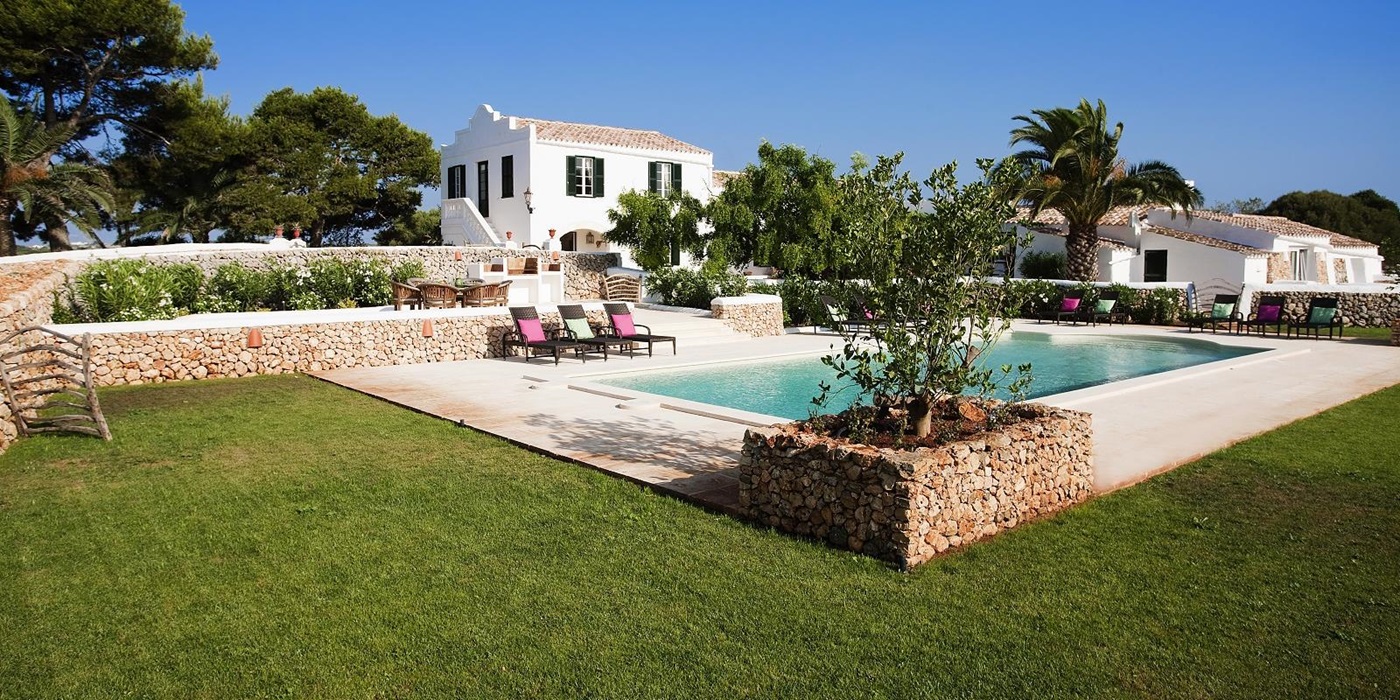The facade and pool at Finca Tortuga in Menorca