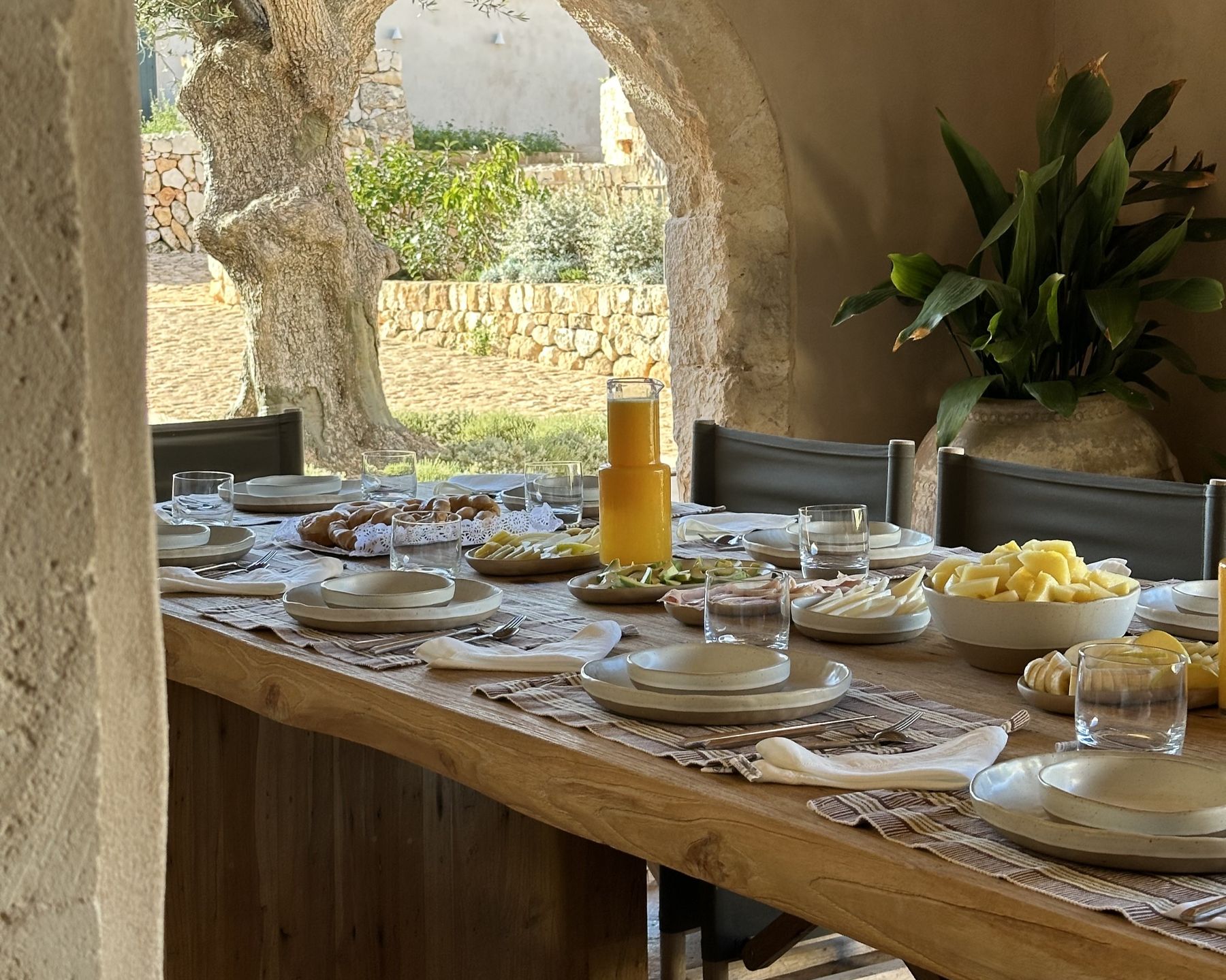 Dining table set for breakfast at Villa Solana, Menorca