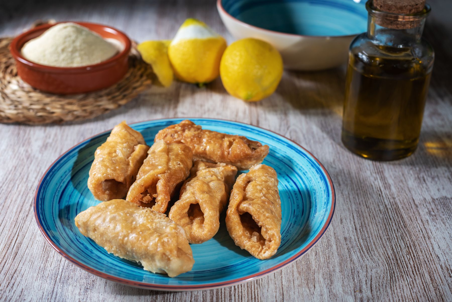 Pestino Spanish pastries on a blue plate