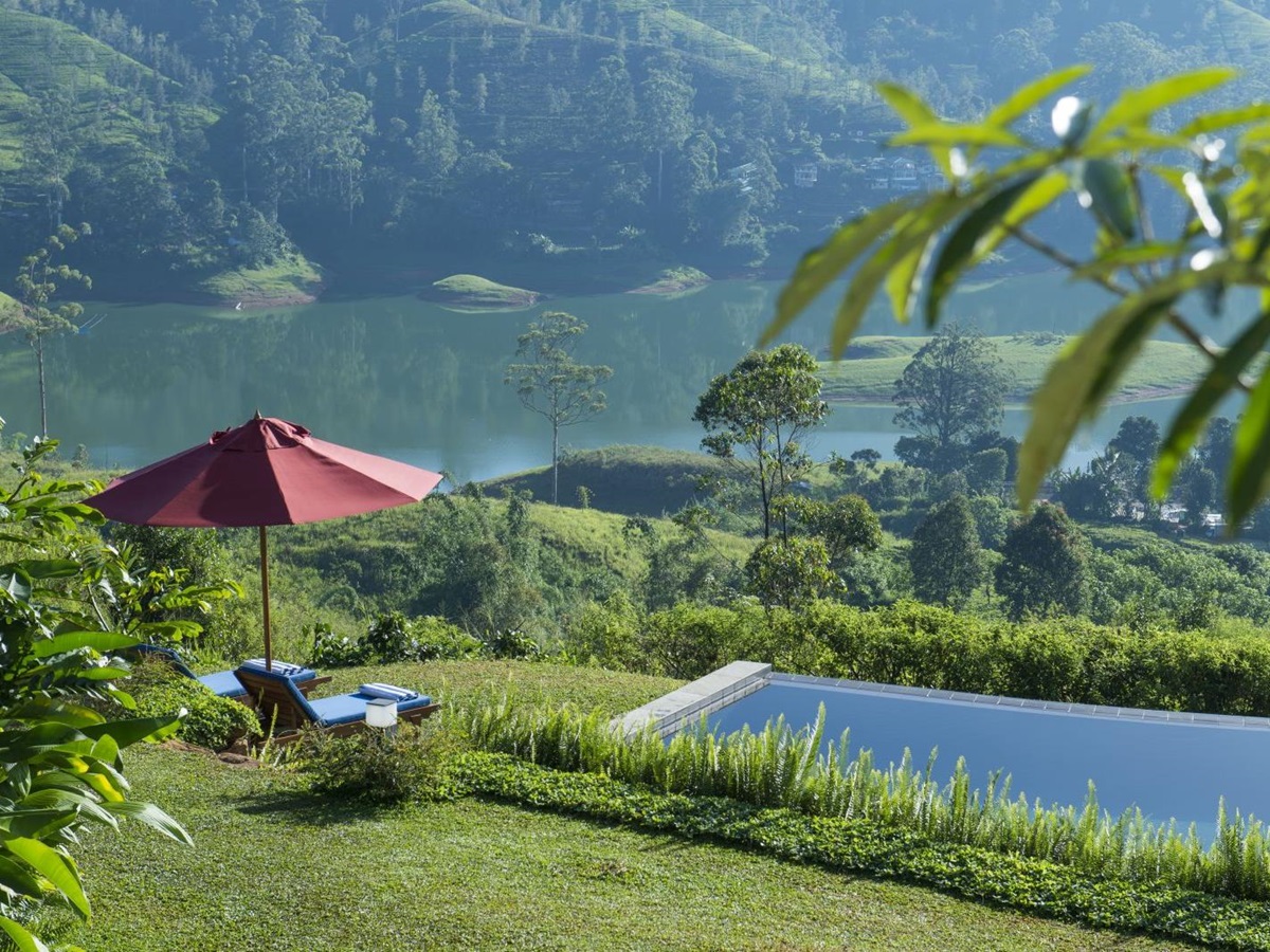 Pool and lake view at Camelia Hills hotel Sri Lanka