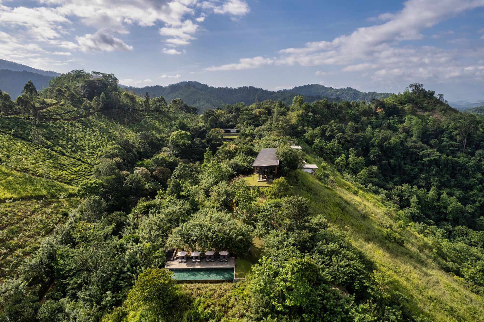 Aerial view of the swimming pool and restaurant at Santani Wellness Resort in Sri Lanka