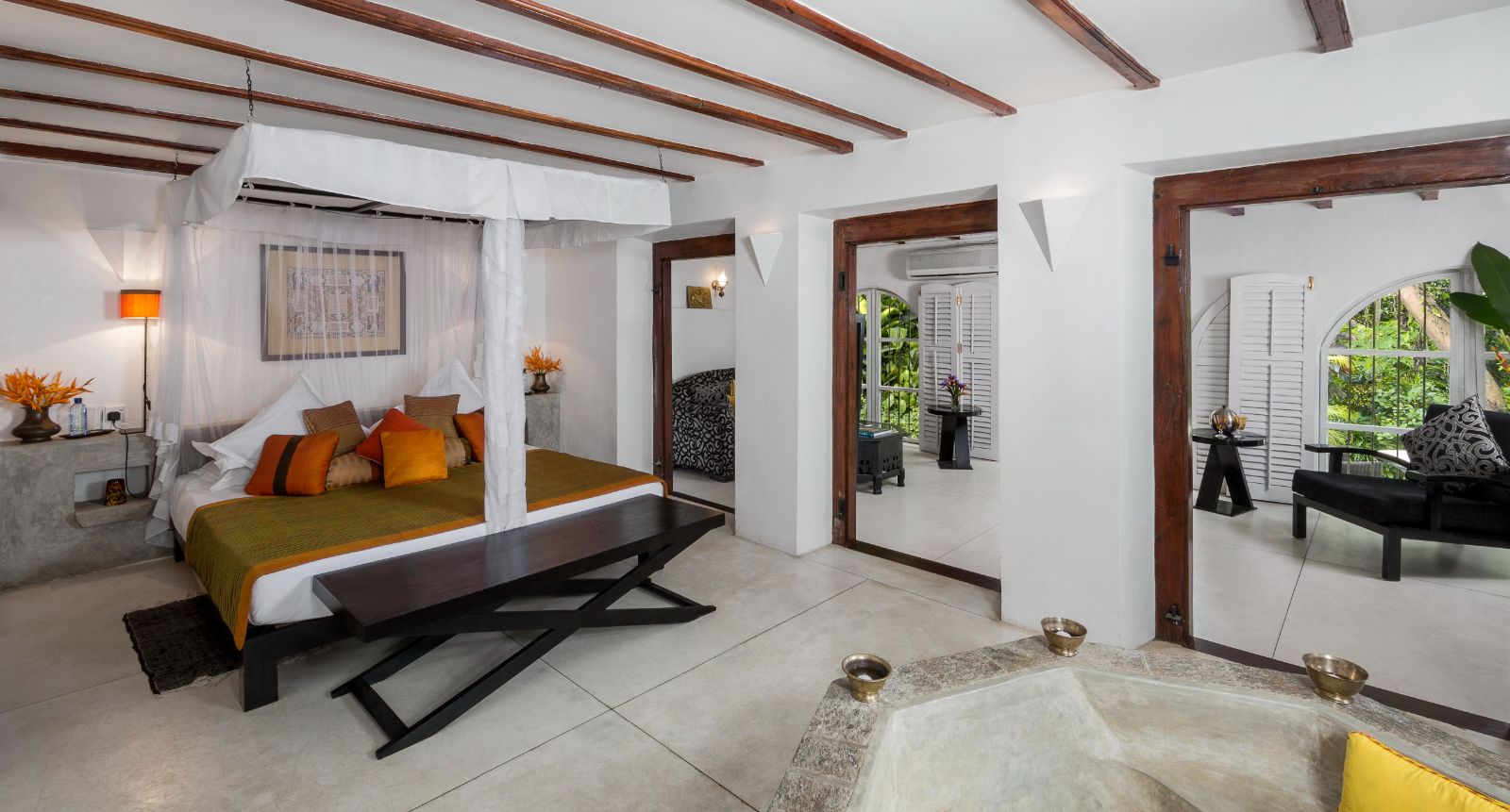 Black Rojah guest suite bed at The kandy house in Sri Lanka