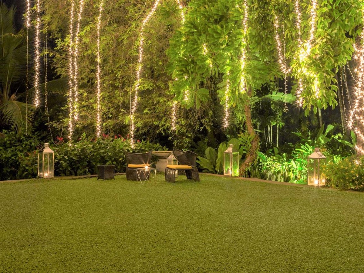 Outside lawn and seating area at The kandy house in Sri Lanka