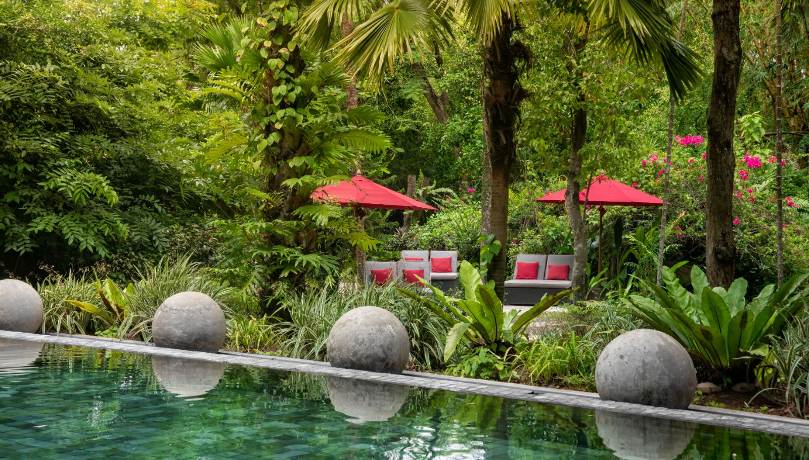 Poolside seating area at The Wallawwa in Sri Lanka