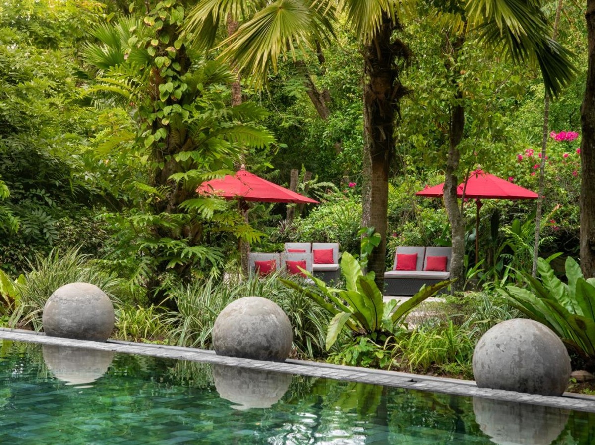 Poolside seating area at The Wallawwa in Sri Lanka
