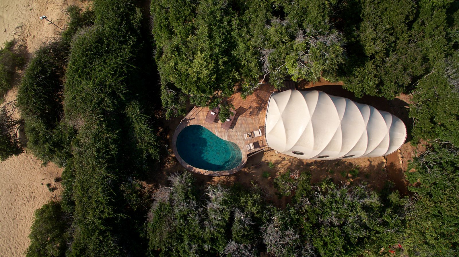 Aerial view of cocoon with pool at Wild Coast Tented Lodge Sri Lanka