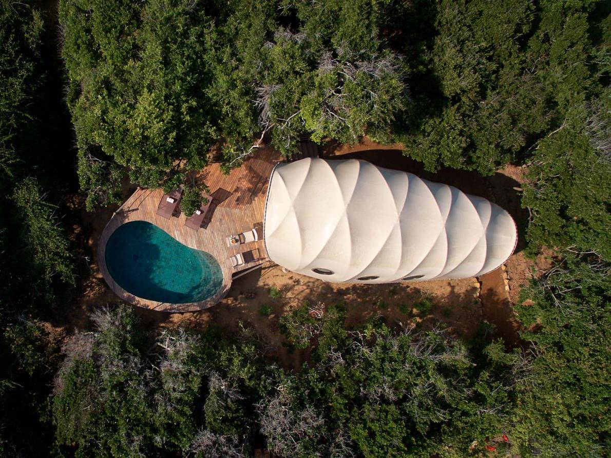 Aerial view of cocoon with pool at Wild Coast Tented Lodge Sri Lanka
