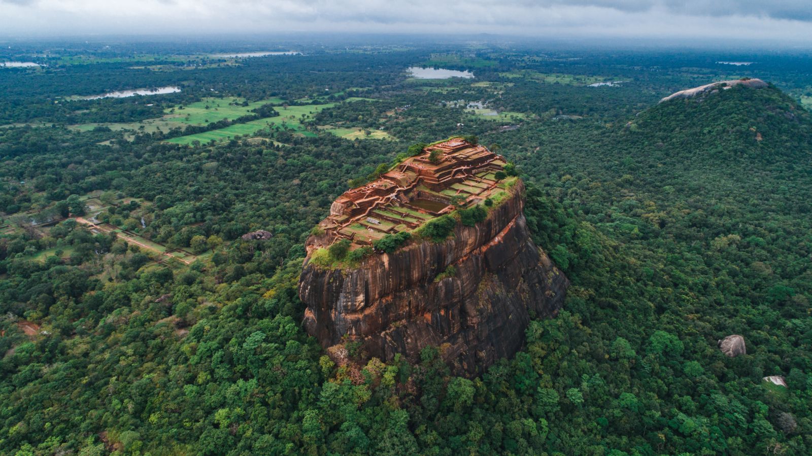 Aerial view of the Sigiriya fortress in Sri Lanka rising above the surrounding forests