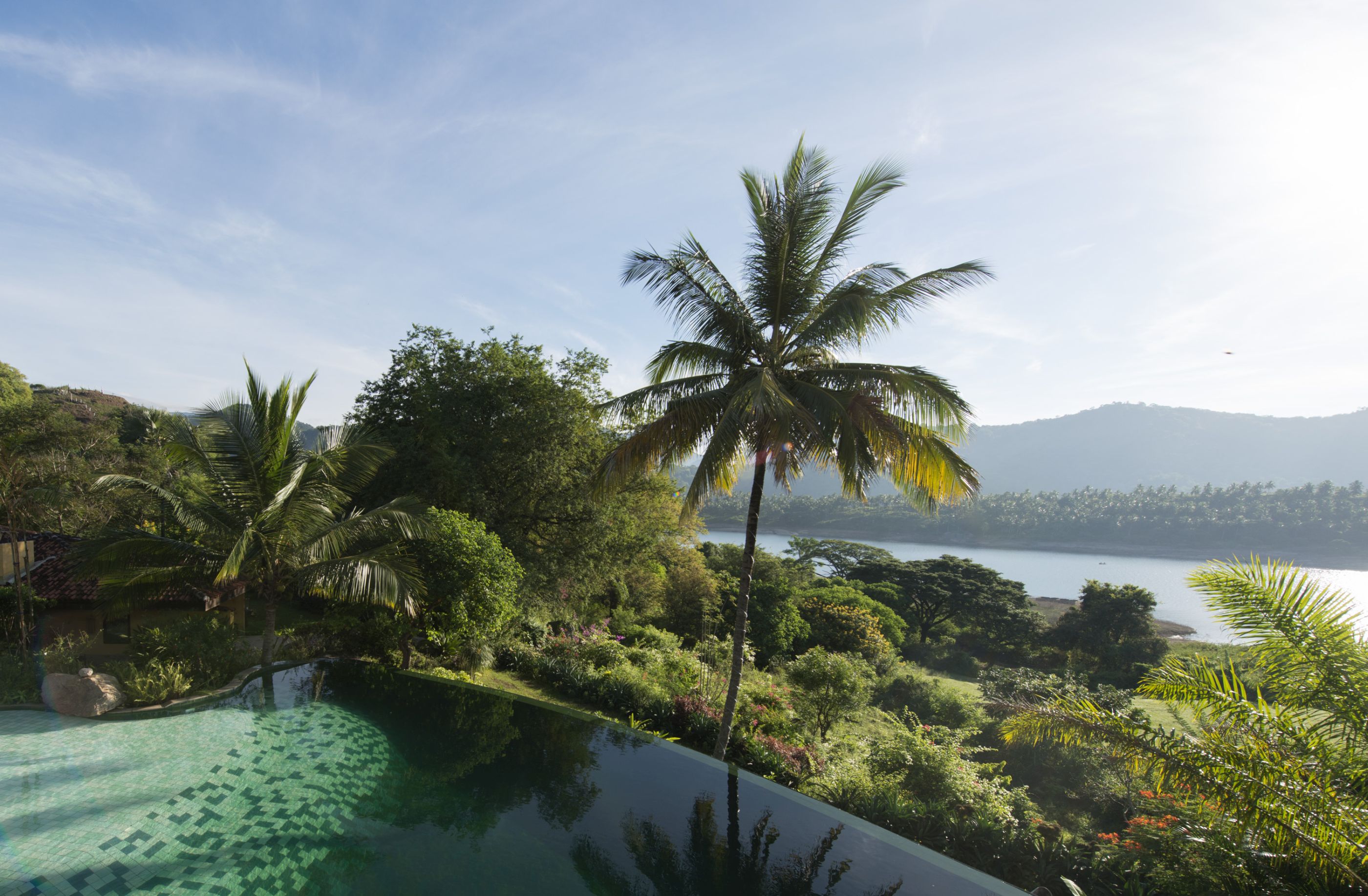 swimming pool with view from bougainvillea, sri lanka