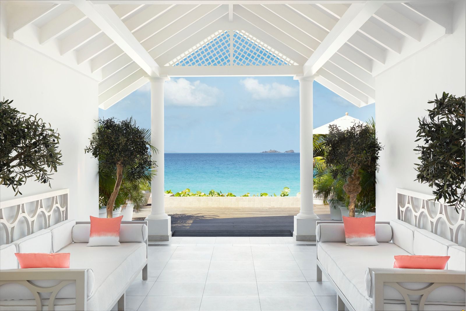 The enterance hallway to Hotel Cheval Blanc in St Barths with a view out onto the beach