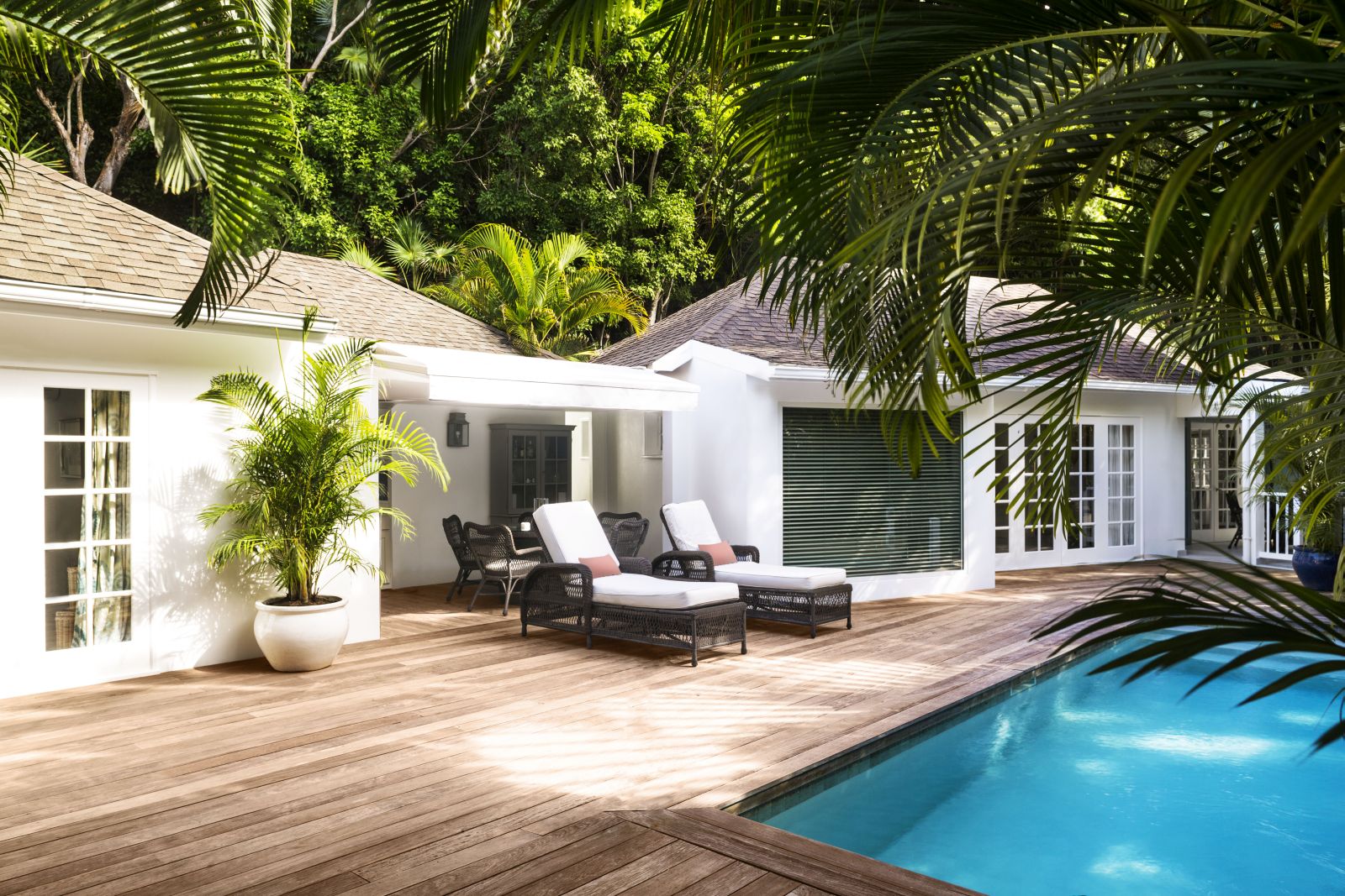 A garden suite with private pool and sun loungers on the deck at Hotel Cheval Blanc in St Barths