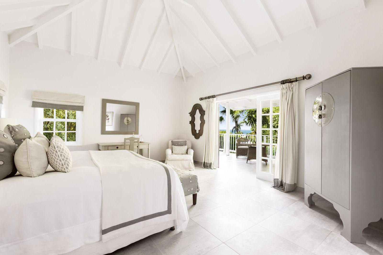 A hillside bungalow at Hotel Cheval Blanc in St Barths decorate in white and grey