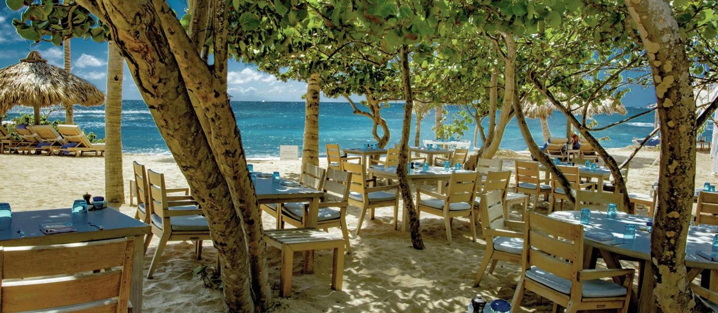 Dining under the trees at Hotel Le Toiny