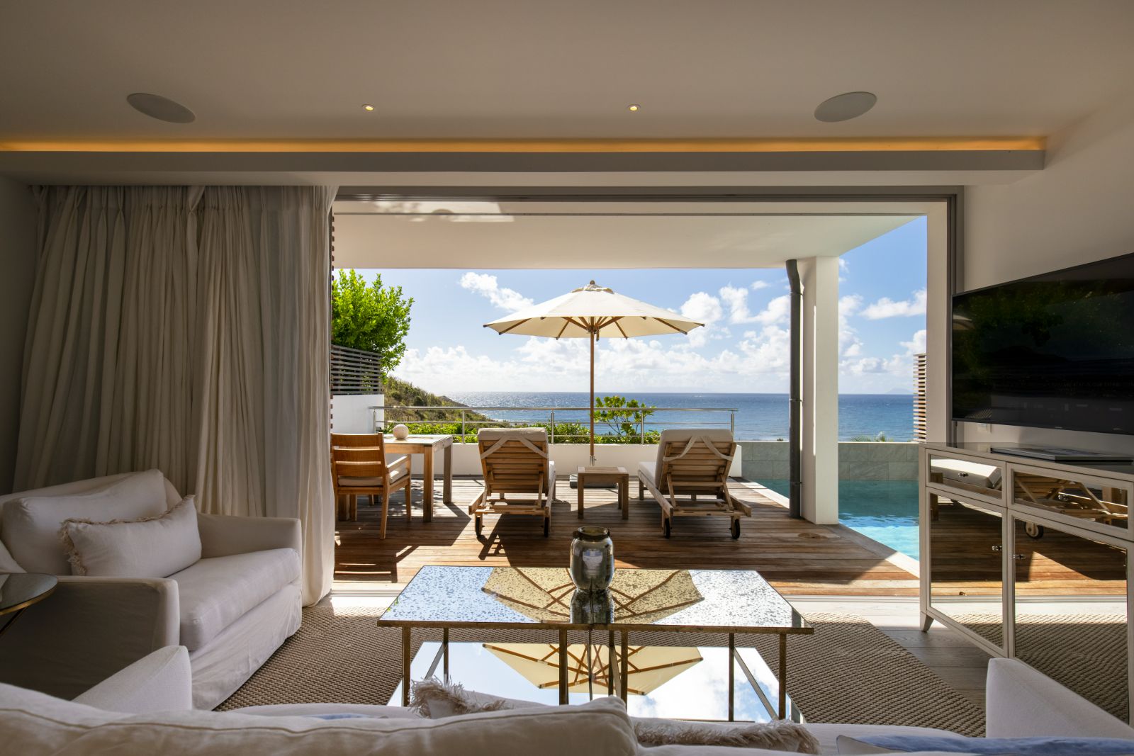 Guest suite lounge with ocean views at Hotel Le Toiny in St Barths