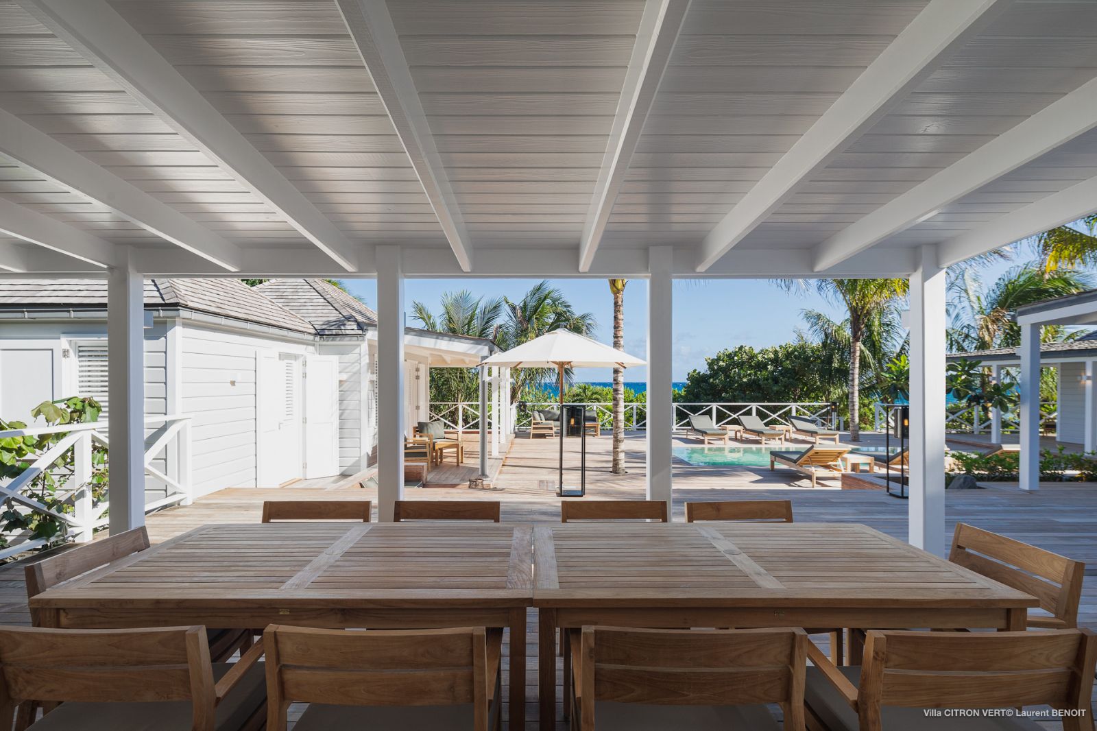 Dining table to with pool view at Villa La Palma in St Barths