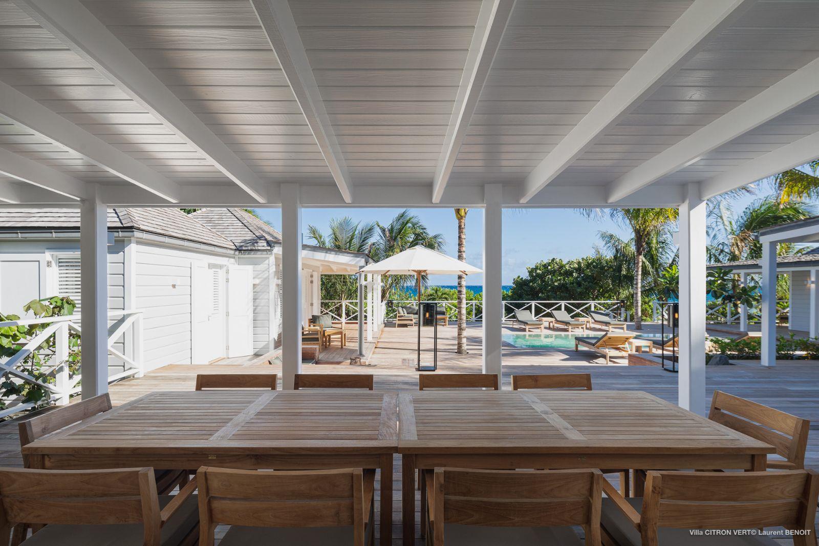 Dining table to with pool view at Villa La Palma in St Barths