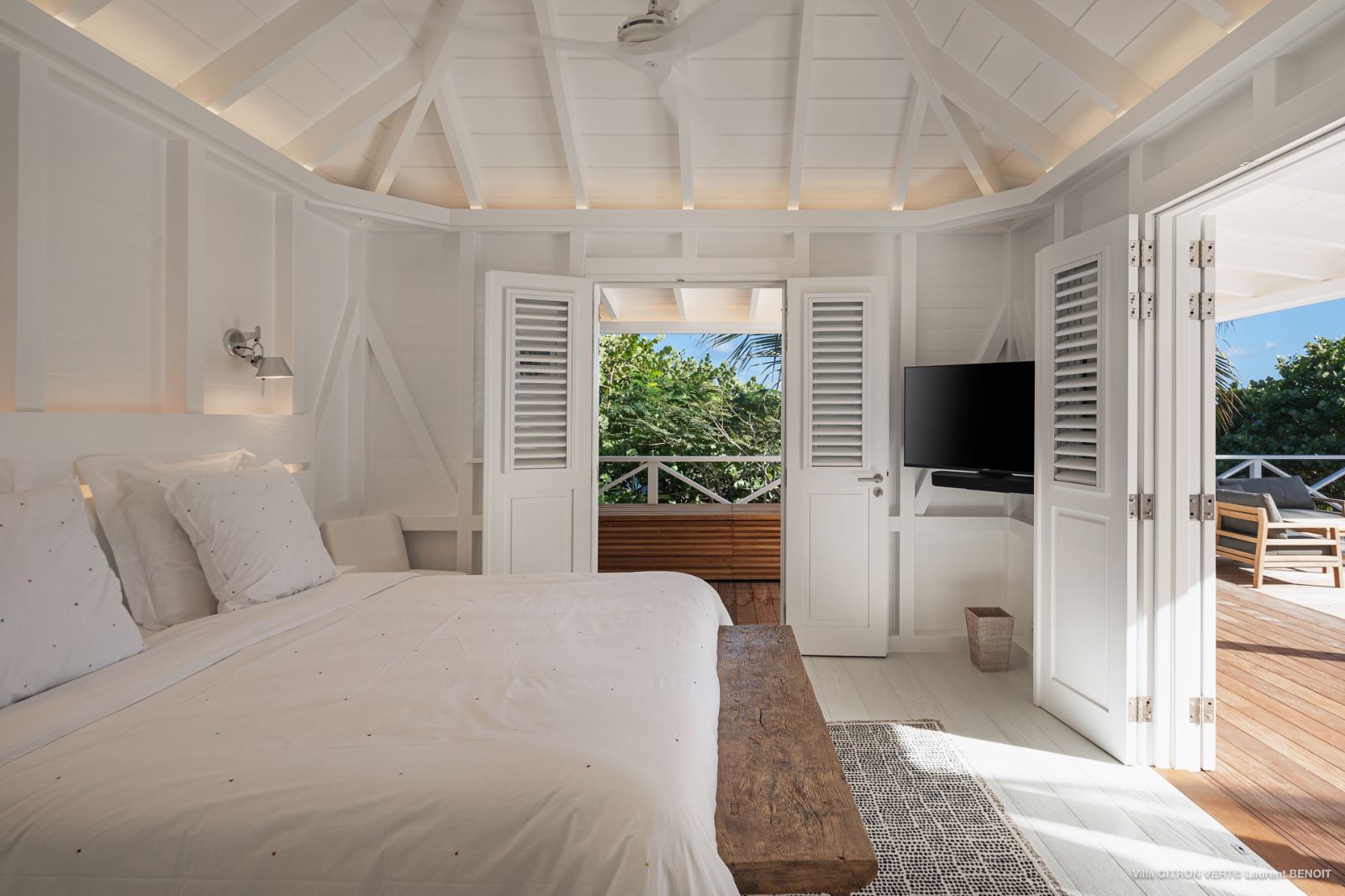 White bedroom with private terrace at Villa La Palma in St Barths