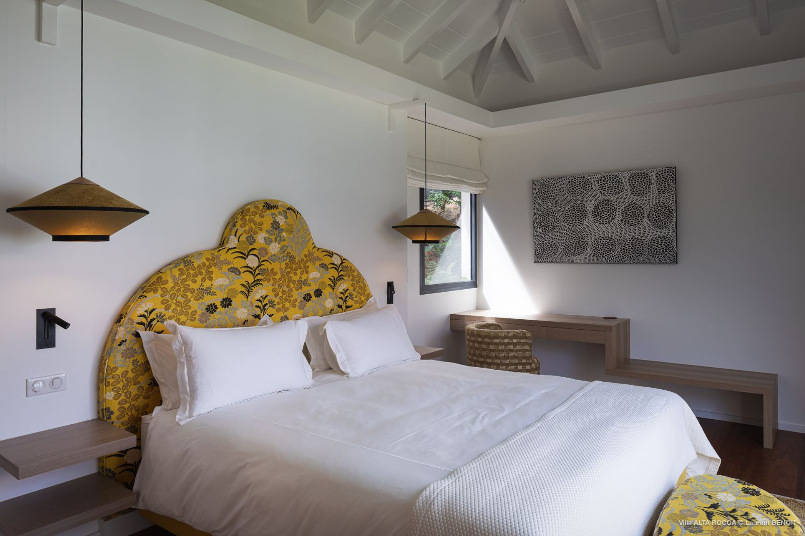 bedroom with yellow headboard