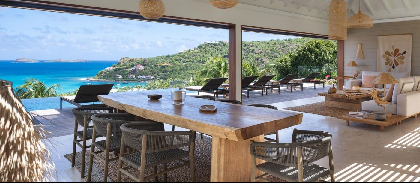 open plan dining table with sea view