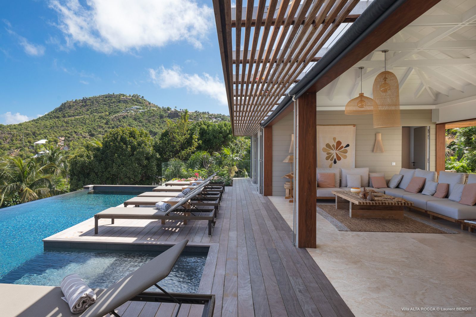 villa side view of pool and terrace