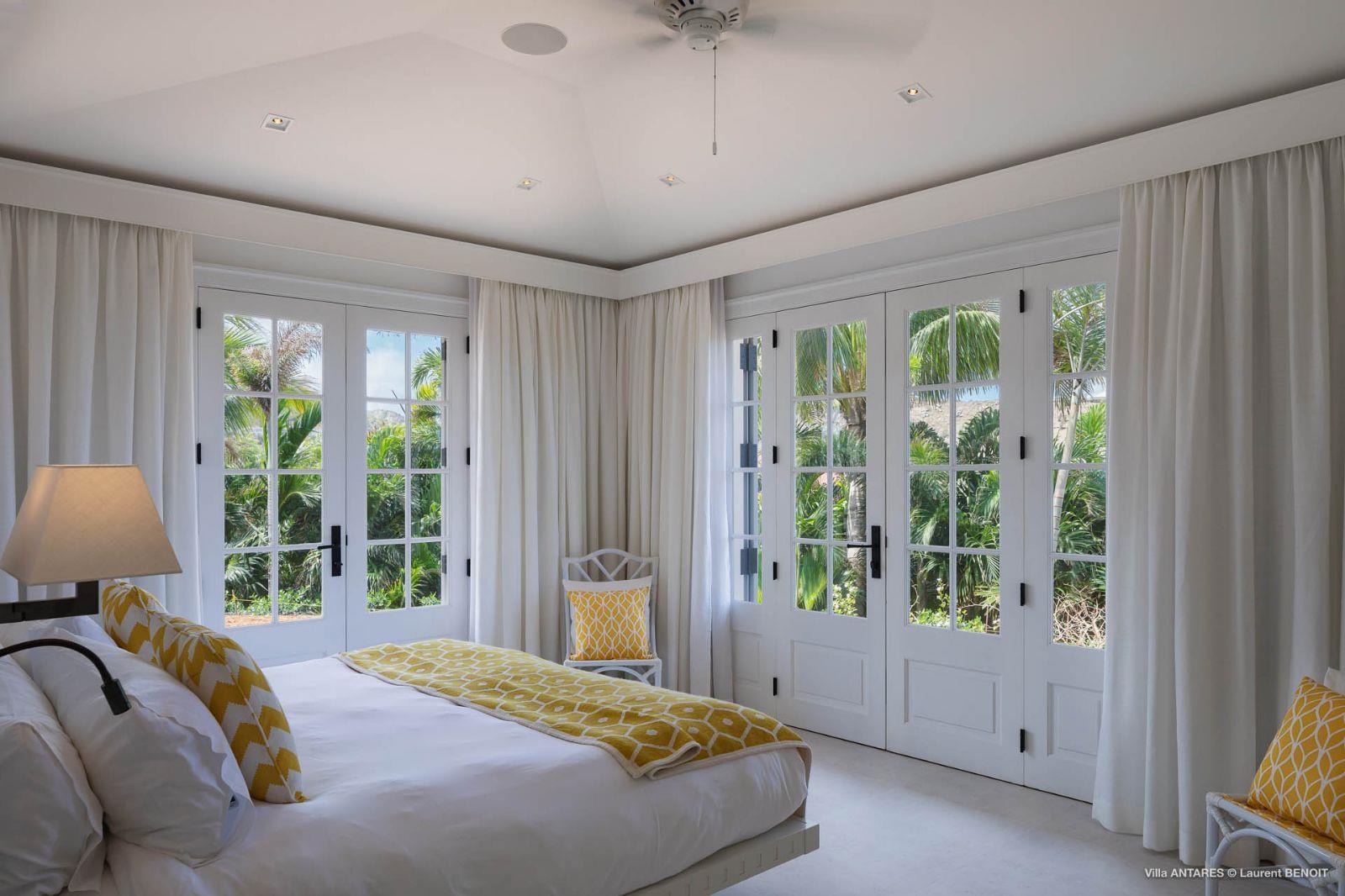 Villa Blanc, St Barths - white bedroom with yellow detailing