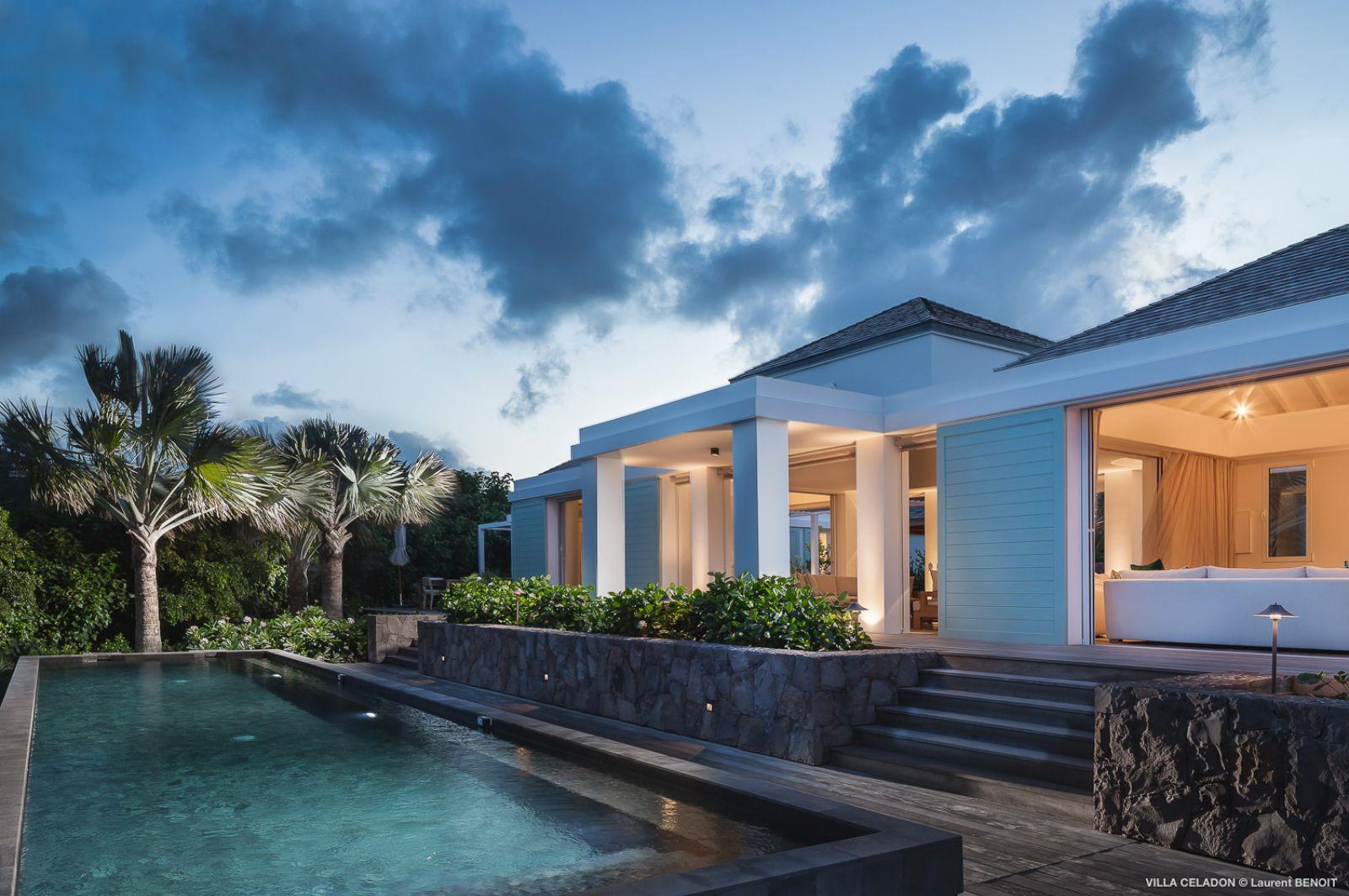 pool and villa at dusk