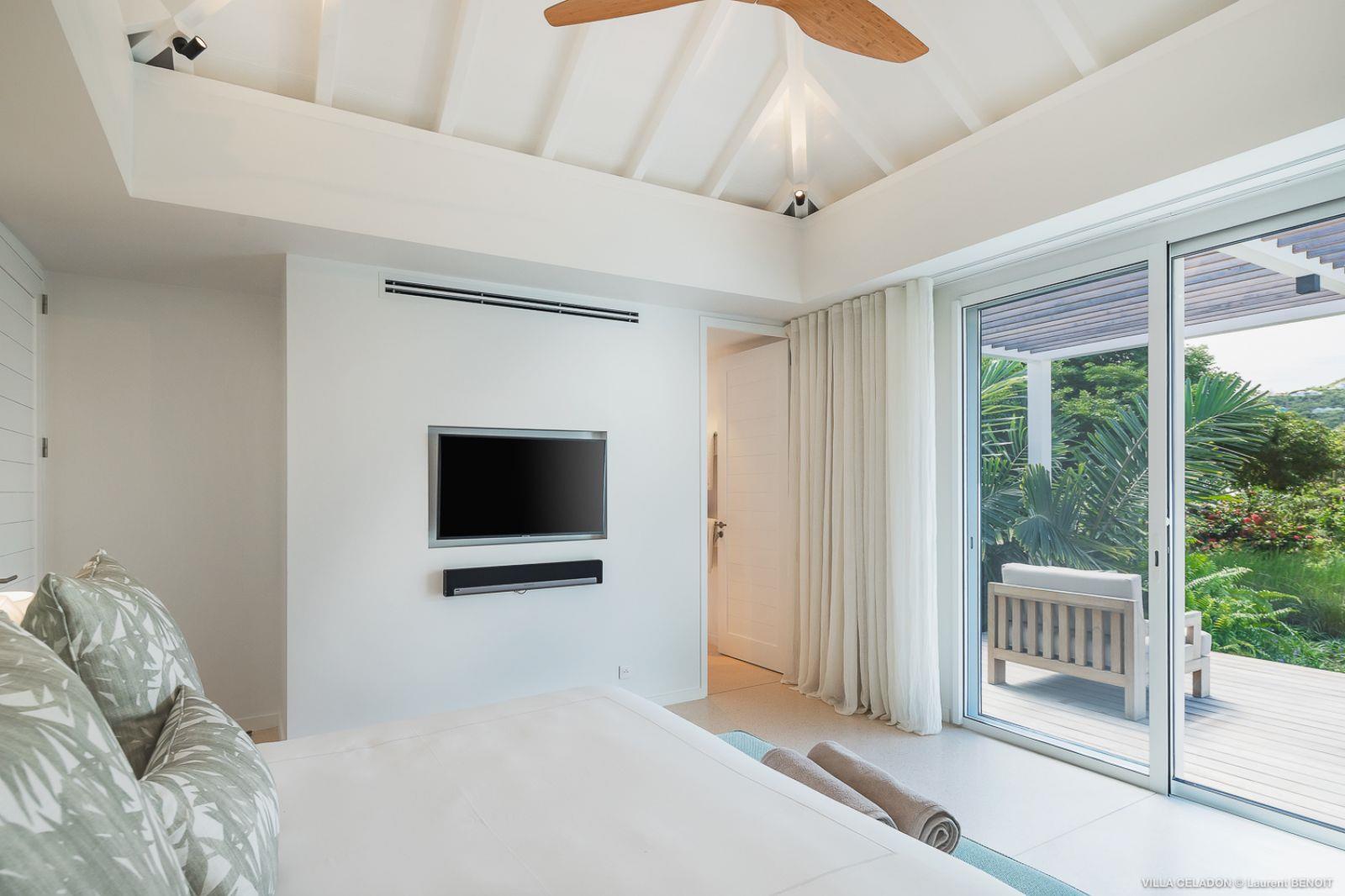 white bedroom with seaview