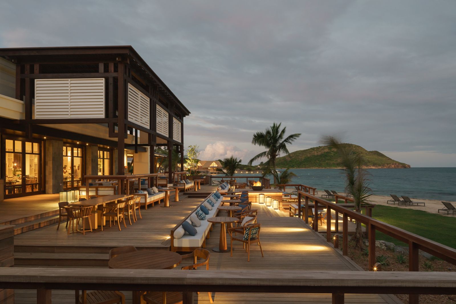 The balcony decking with seating at sunset at the Park Hyatt St. Kitts Christophe Harbour Hotel