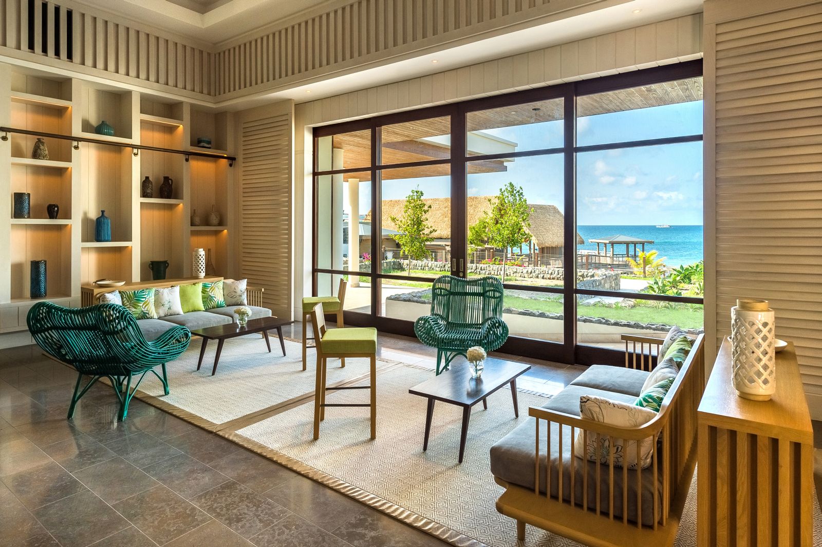 A view of the beach from the panoramic window in the living room at the Park Hyatt St. Kitts Christophe Harbour Hotel