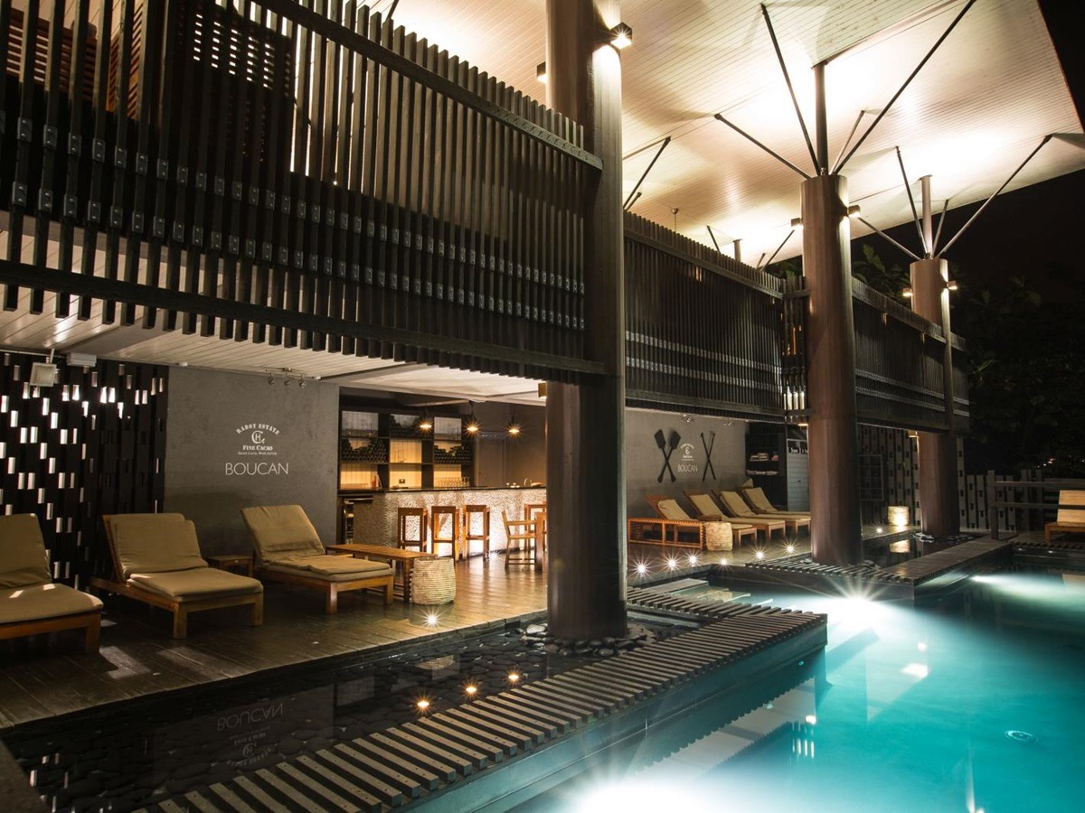 The pool at night at Boucan by Hotel Chocolat