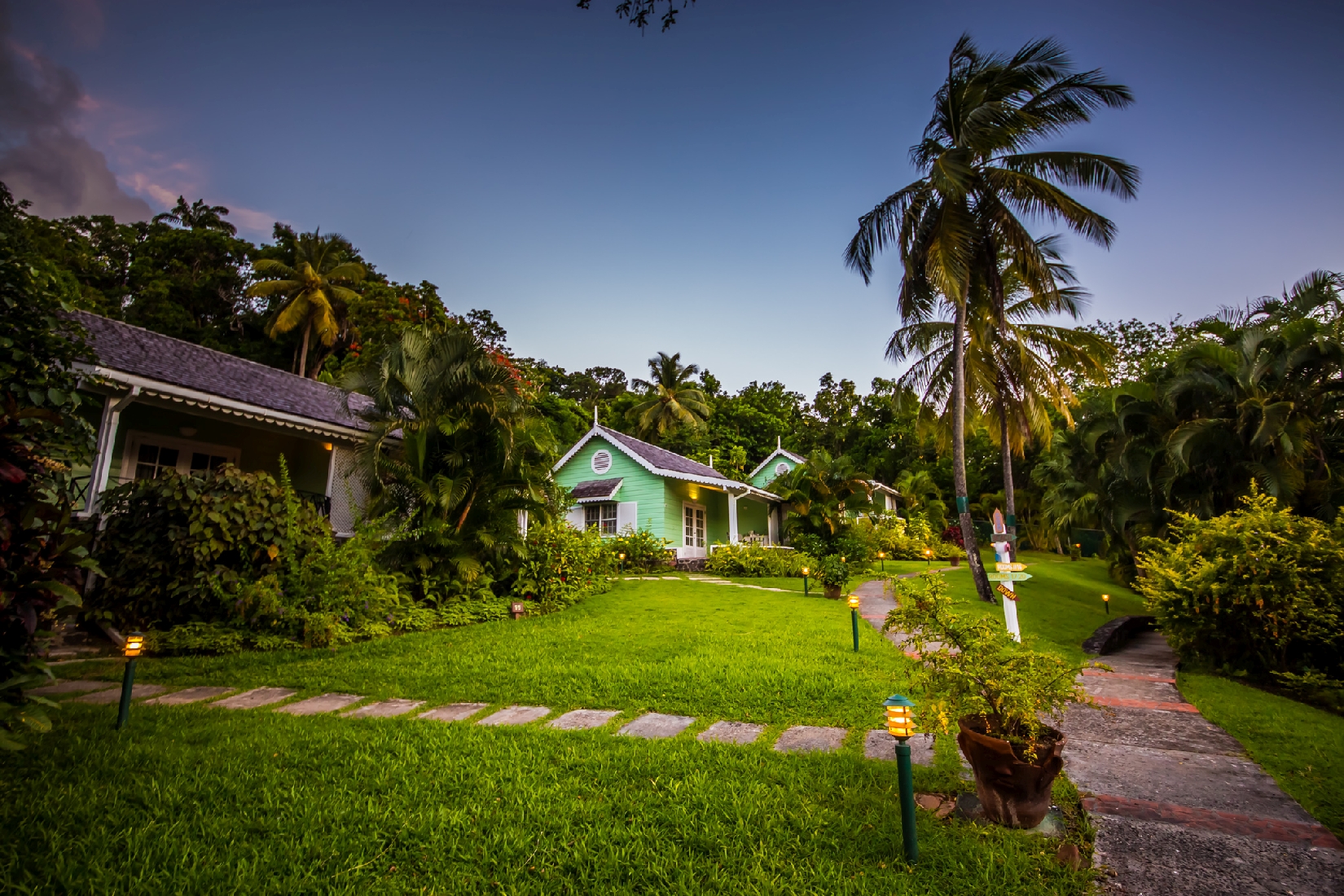 The garden setting of deluxe cottages in East Winds, St Lucia