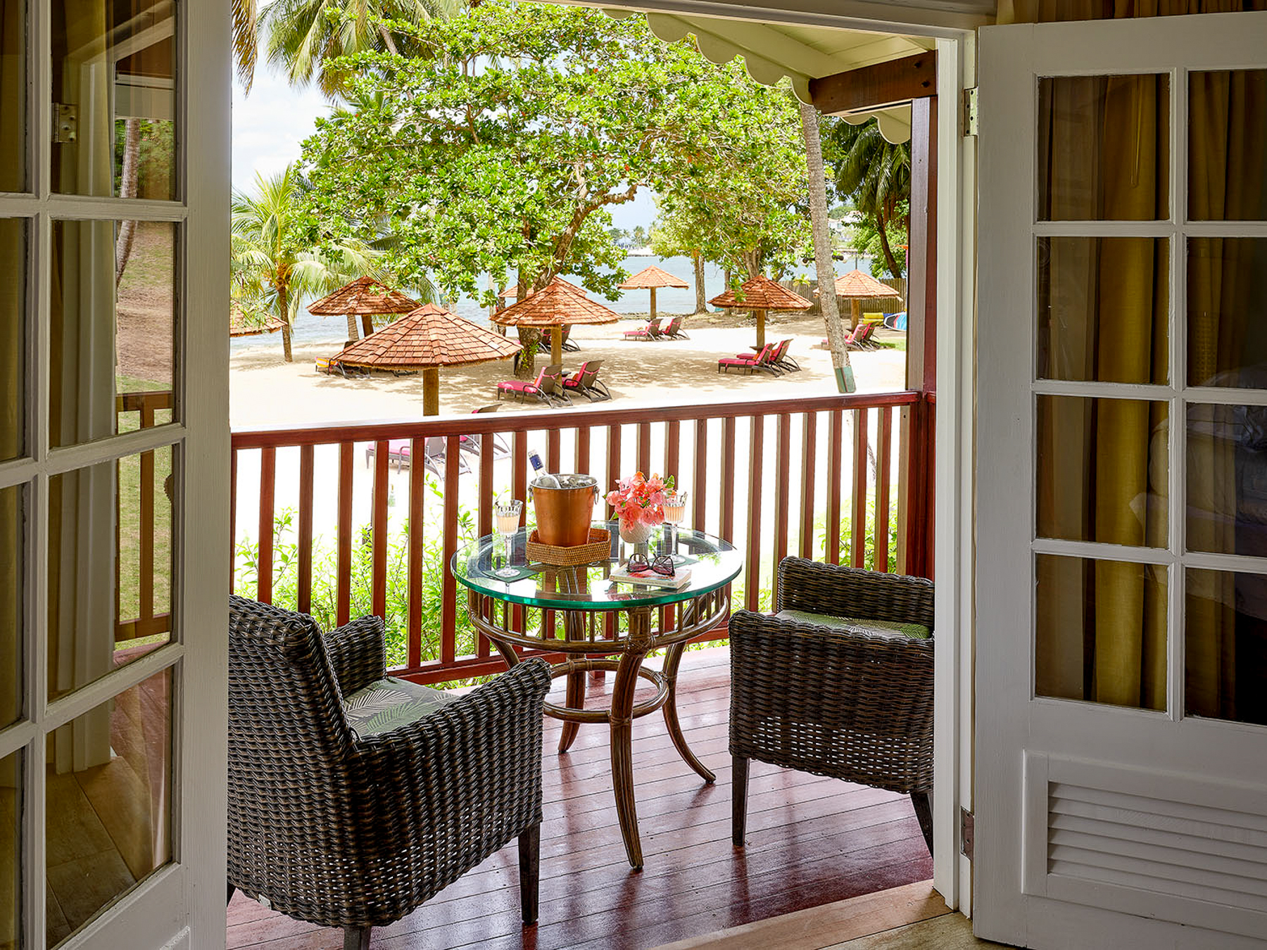 Beach view from a guest terrace at East Winds luxury Resort in St Lucia