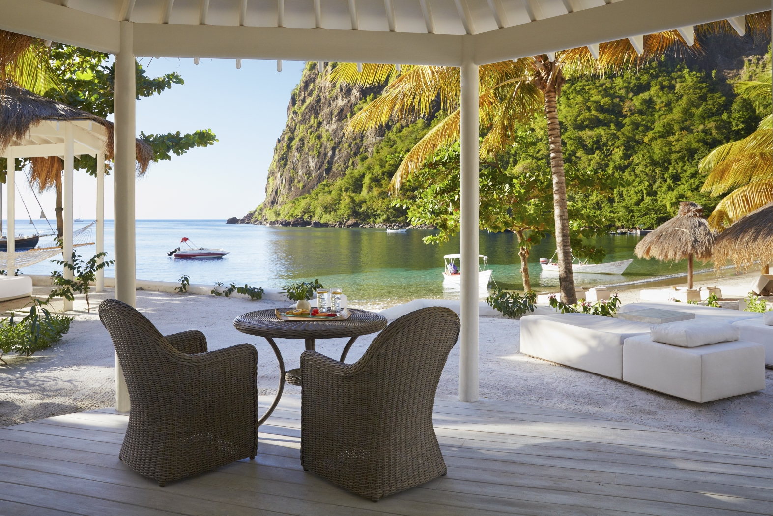 The deck of a Luxury Beachfront Bungalow at The deck of a Superior Luxury Cottage at Sugar Beach, St Lucia