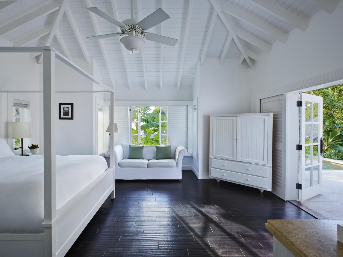 A double bedroom of a Luxury Cottage at The deck of a Superior Luxury Cottage at Sugar Beach, St Lucia