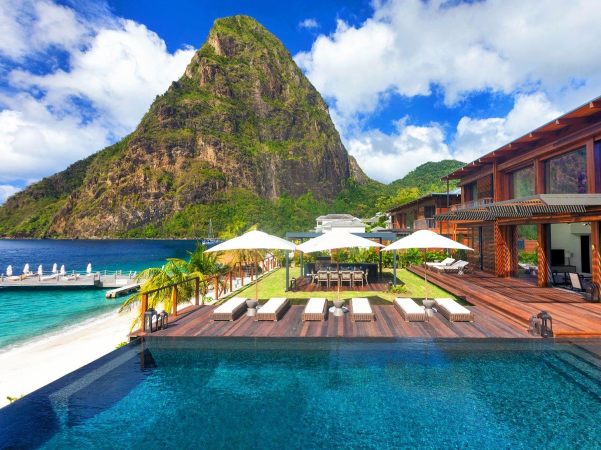 Swimming pool at Sugar Beach St Lucia with backdrop of the Pitons