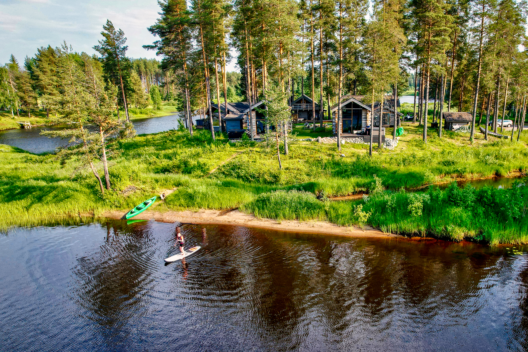 Canoes on the river at Arctic Retreat in Swedish Lapland