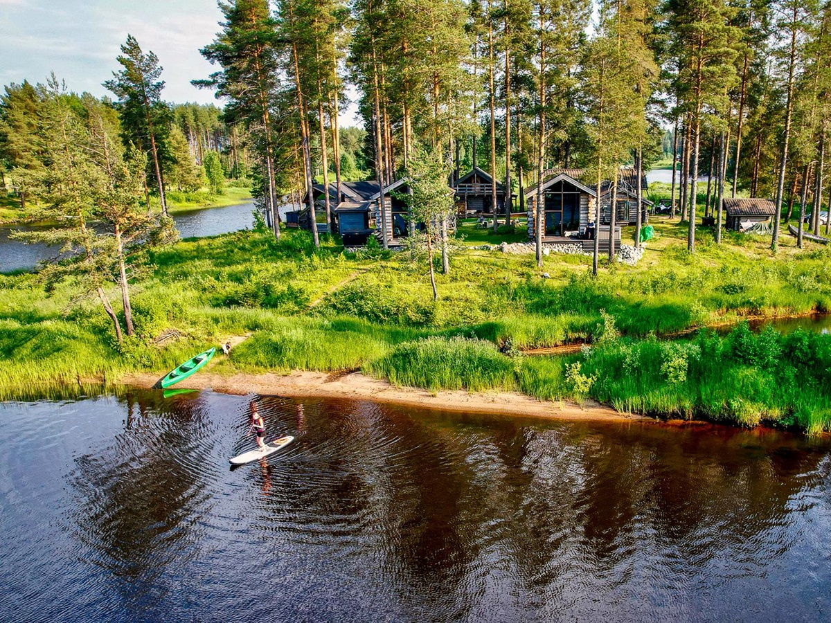 Canoes on the river at Arctic Retreat in Swedish Lapland
