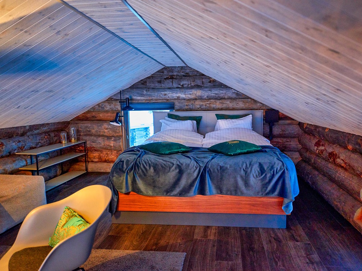 Guest bedroom in a cabin at Arctic retreat in Swedish Lapland