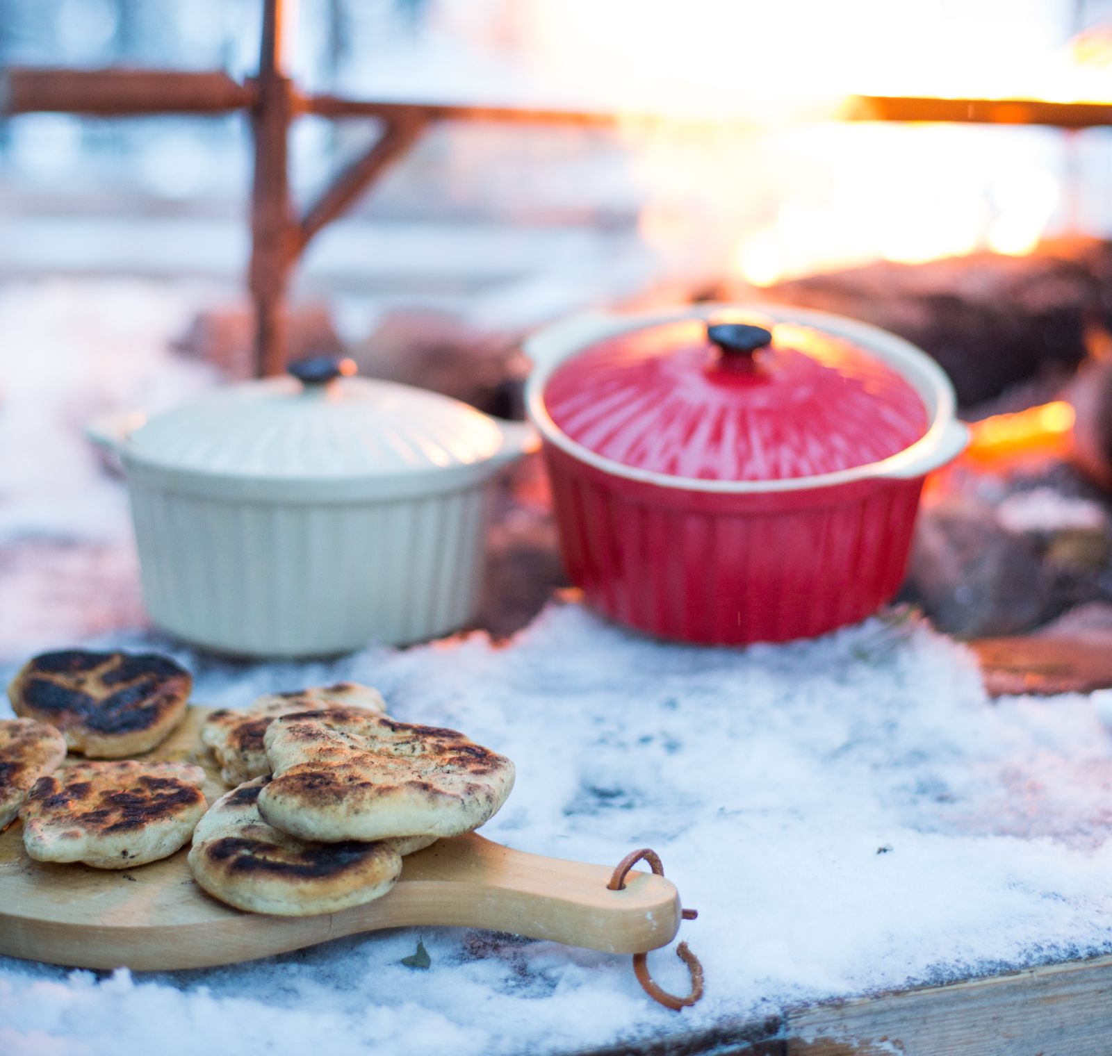 Outdoor cooking during a stay at Aurora Safari Camp in Sweden