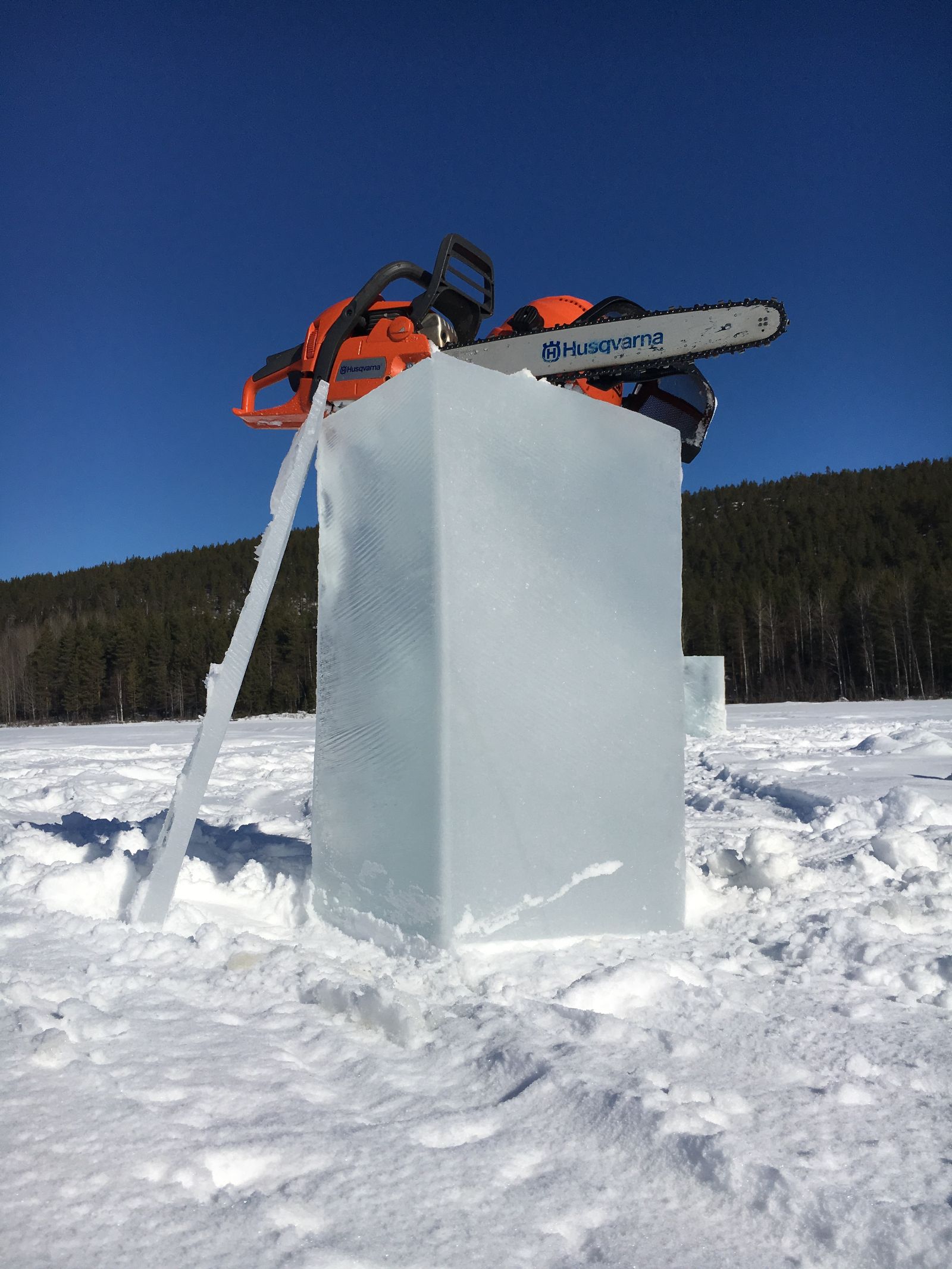 A block of ice and a chain saw ready for some ice sculpting at Aurora Safari Camp in Sweden