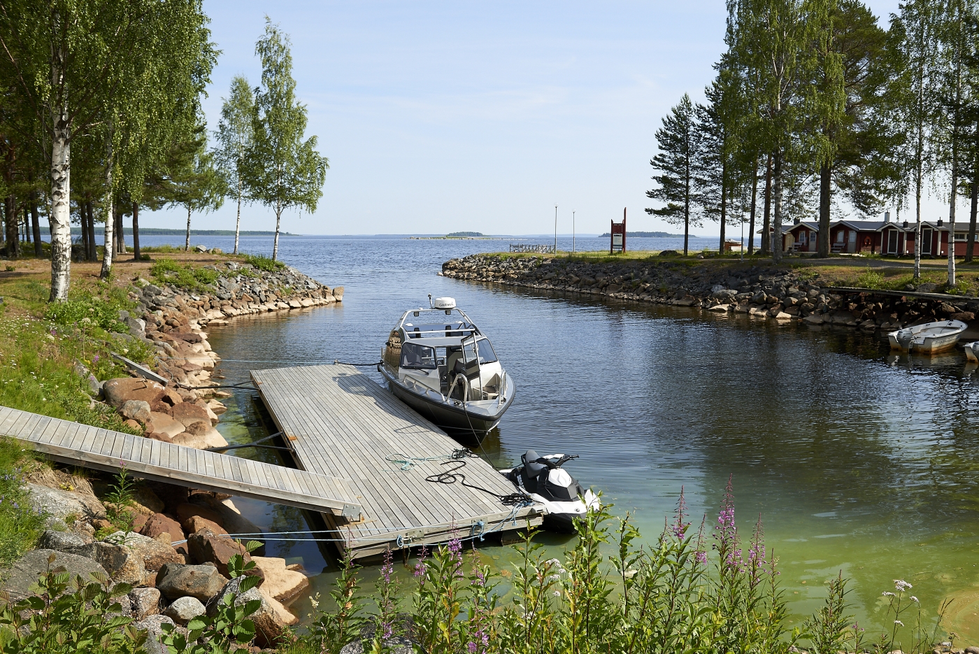 Boat dock in summer at Brandon Lodge in Sweden
