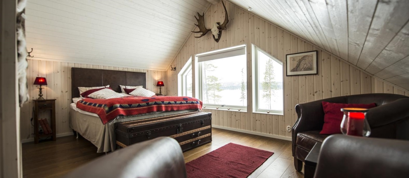 Master cabin bedroom at Fjellborg Arctic Lodge in Sweden