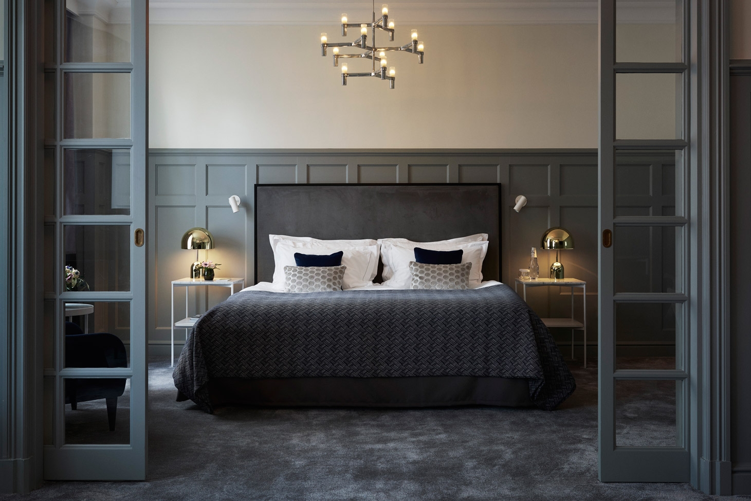 Bedroom with glass sliding doors at Grand Hotel