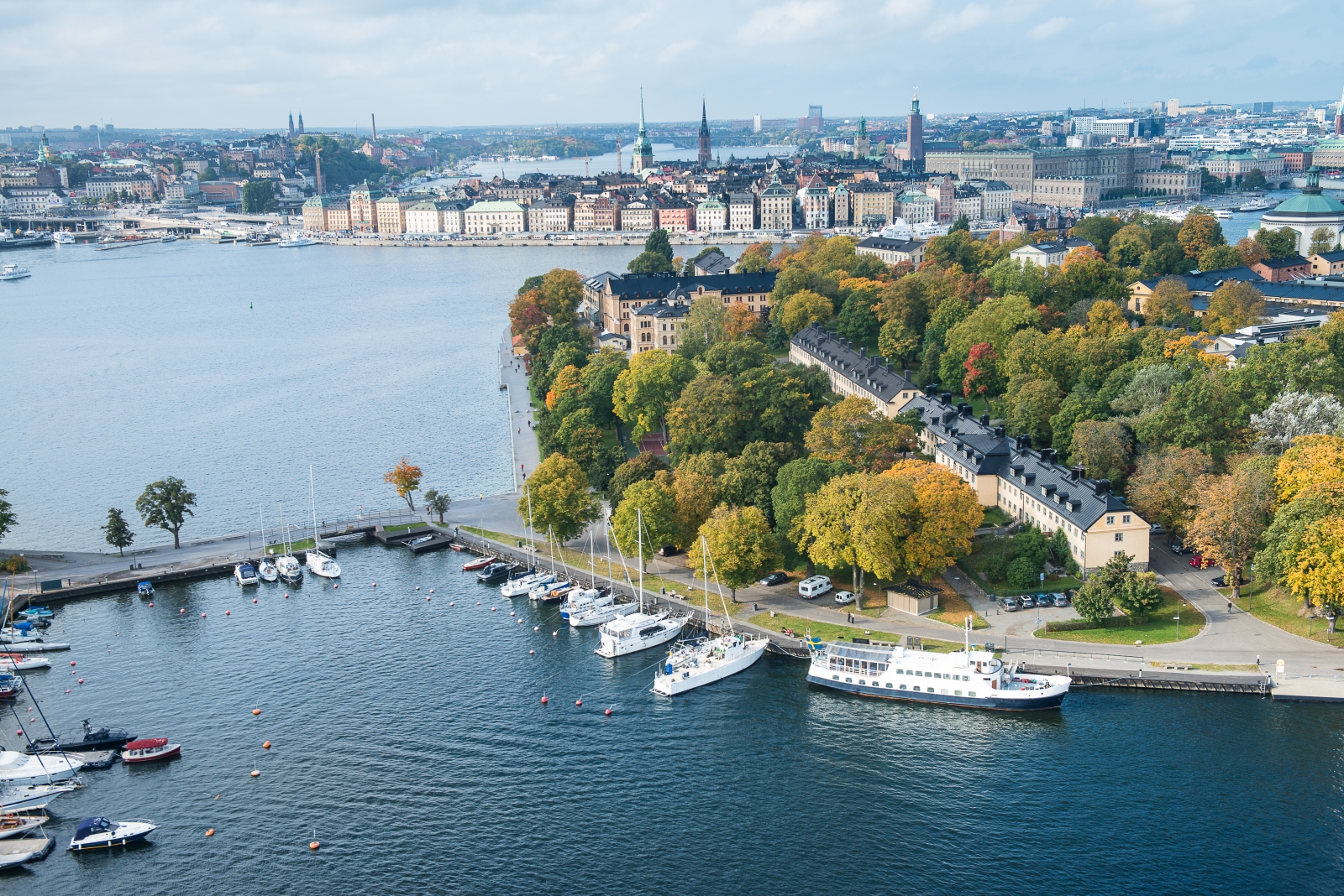 Aerial view of Hotel Skeppsholmen with the sea and city in the background