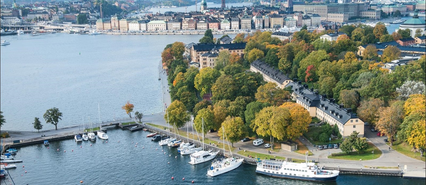 Aerial view of Hotel Skeppsholmen with the sea and city in the background