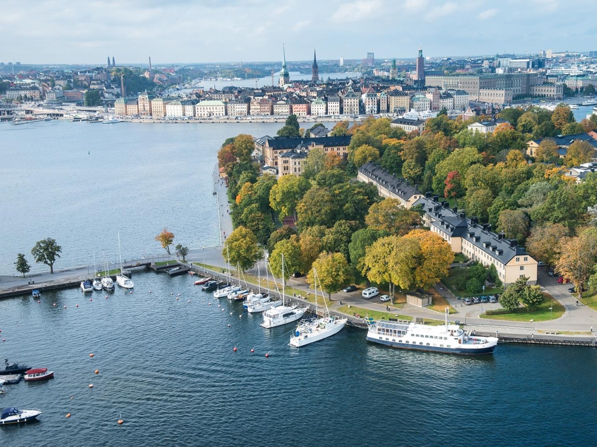 Aerial view of Hotel Skeppsholmen with the sea and city in the background